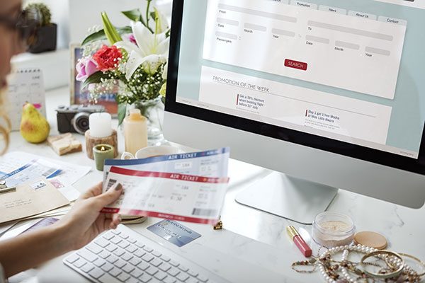 woman-booking-ticket-online